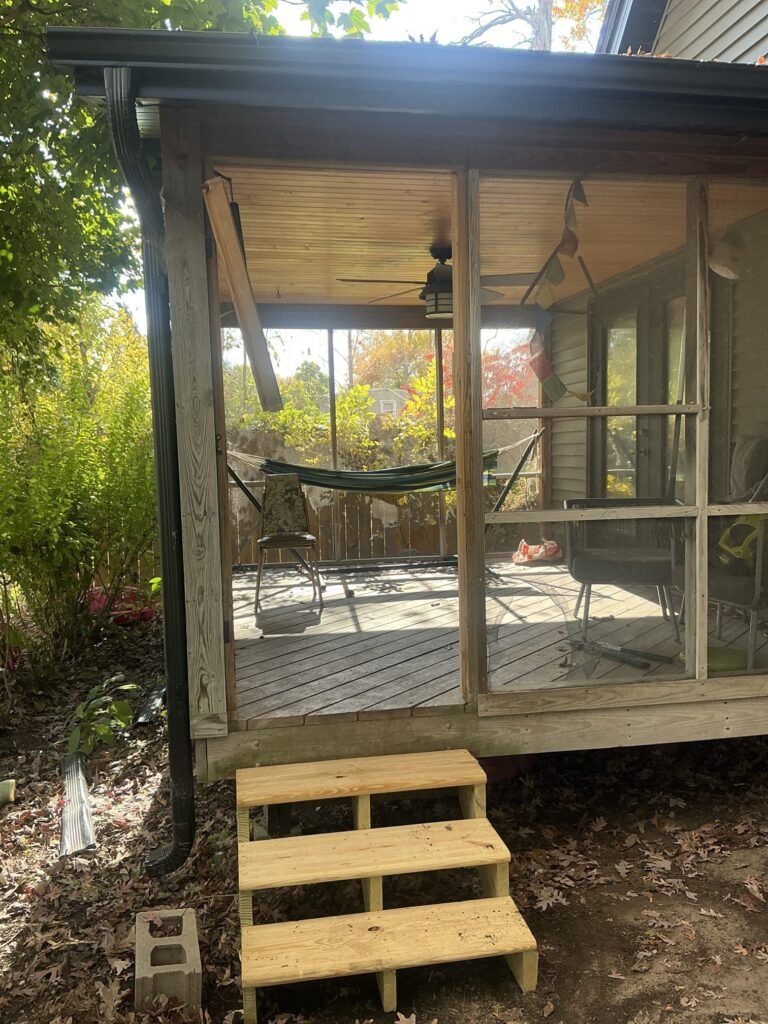 New wood steps built for a screened back porch